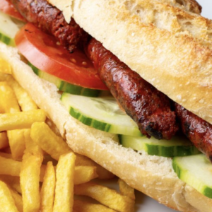Image d'un burger savoureux de Munchies73 à La Tronche, garni d'ingrédients frais et de qualité, prêt à être dégusté.